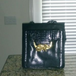 Gold buckel elephant purse